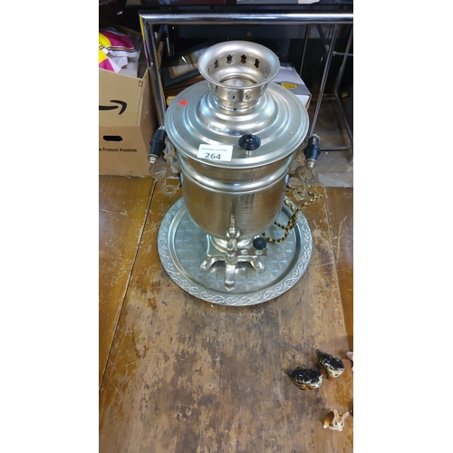 264 - Vintage Soviet-era electric samovar with ornate handles and matching tray, crafted from metal with a... 