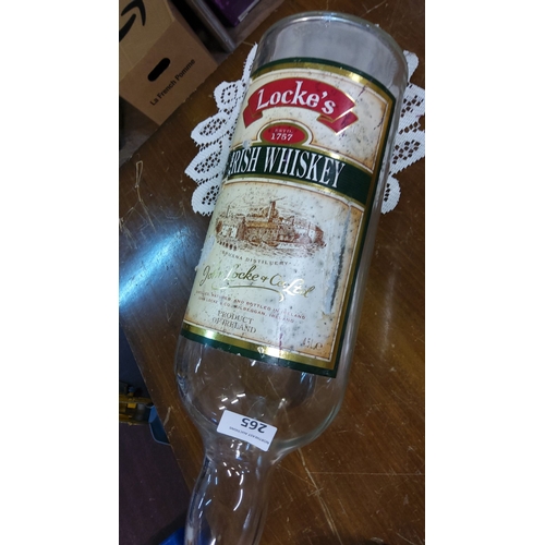 265 - Large Locke's Irish Whiskey promotional glass bottle, 4.5L. Features Kilbeggan distillery label with... 