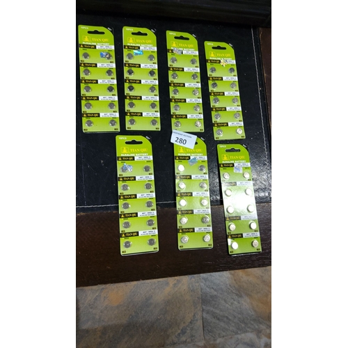 280 - Lot of Tian Qiu AG7 395A button cell alkaline batteries, 7 packs of ten. Sealed and unused.