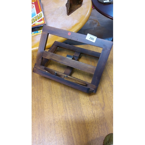 286 - Antique wooden adjustable book stand from the early 20th century. Made of dark-stained hardwood with... 