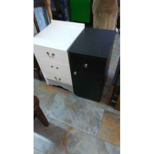 325 - Pair of modern bedside cabinets, one white with three drawers and brass handles, the other black wit... 