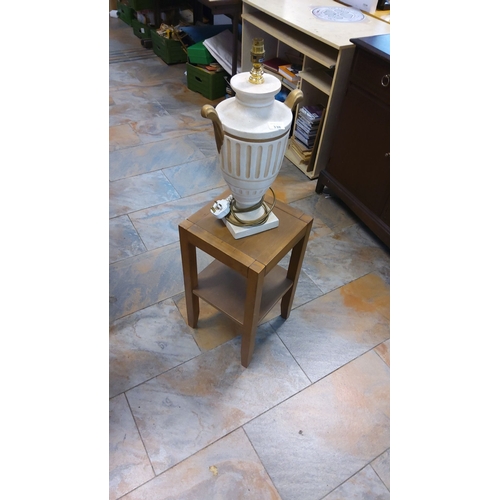 338 - Large vintage urn-shaped table lamp with gold accents, mounted on a square base.