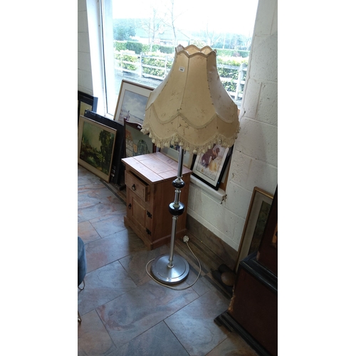 344 - Vintage floor lamp with a scalloped fabric shade, metal and black accents, and a weighted base.(need... 