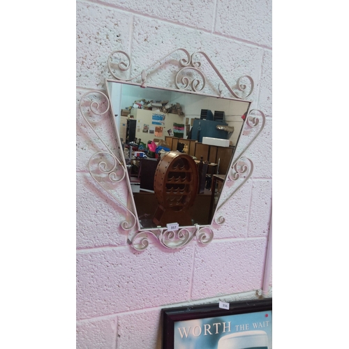 357 - Vintage wrought iron wall mirror with ornate scrollwork frame, painted in a distressed white finish.