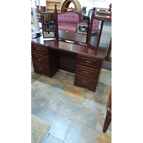 361 - Vintage wooden vanity dresser with tri-fold mirror features six drawers with brass handles and decor... 