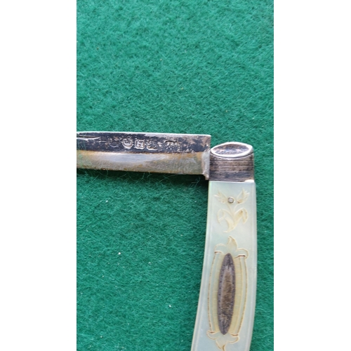 369 - Antique folding penknife with a hallmarked silver blade and a decorative mother-of-pearl handle. Fea... 