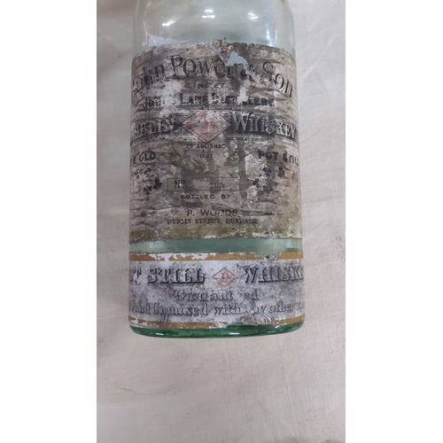 383 - Rare antique John Power & Son Irish whiskey bottle, from the late 19th to early 20th century. Featur... 