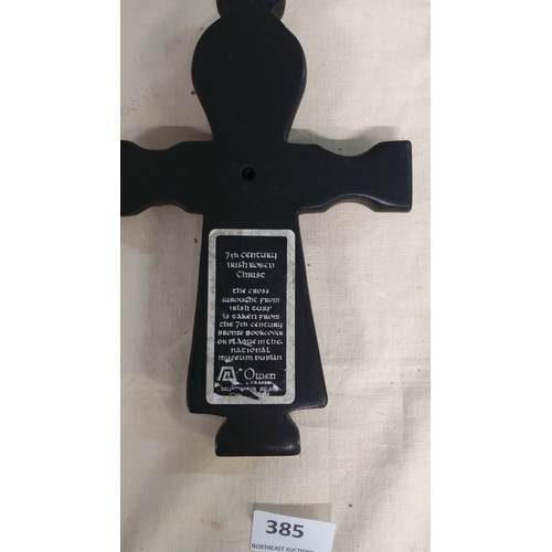 385 - Irish turf cross features a 7th-century robed Christ design.