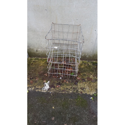 460 - Vintage industrial wire storage crates  made from sturdy metal construction.