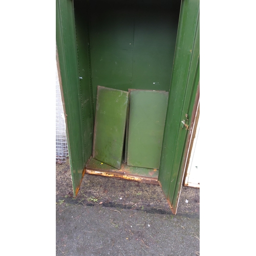 462 - Vintage metal storage cabinet with double doors, painted white. Includes 4 removable green metal she... 