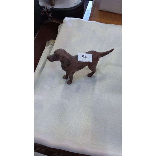 54 - Hand-painted resin dachshund figurine, finely detailed with lifelike texture.