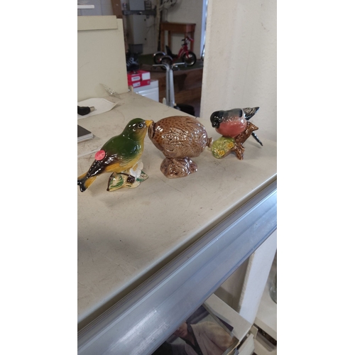 1 - Beswick ceramic bird figurines include a Greenfinch and Bullfinch, with stamped marks. They feature ... 