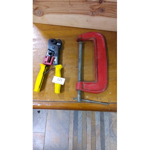 121 - Vintage red cast iron G-clamp and professional-grade crimping tool with yellow handles.