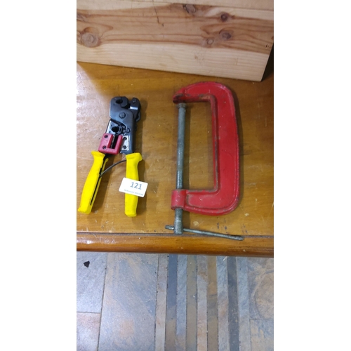 121 - Vintage red cast iron G-clamp and professional-grade crimping tool with yellow handles.