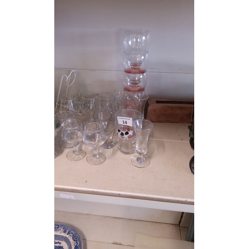 14 - Mixed lot of assorted glassware, including stemmed glasses, tumblers, and decorative pieces. Various... 