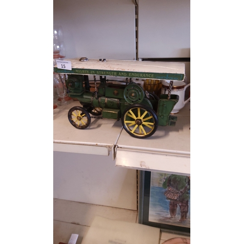 15 - Vintage tinplate model traction engine with canopy, featuring 