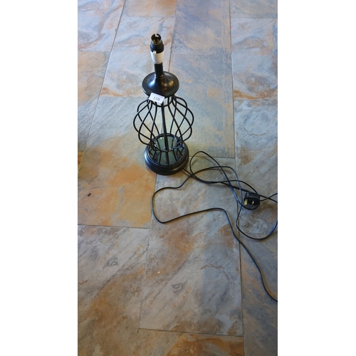 159 - Black metal table lamp base with an openwork design.