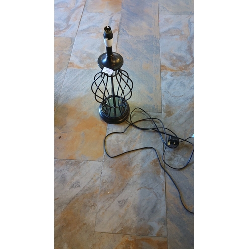 159 - Black metal table lamp base with an openwork design.