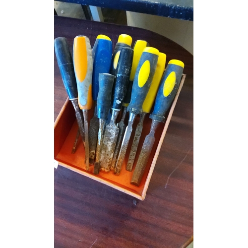 162 - Set of vintage woodworking chisels with plastic handles.