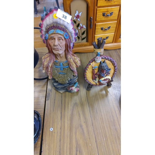 38 - Hand-painted Native American-themed resin figurines, featuring a detailed chief bust with feathered ... 