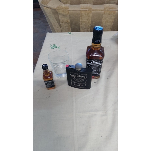 4 - Jack Daniel’s whiskey set includes a half bottle size and miniature bottle of Old No. 7, branded hip... 