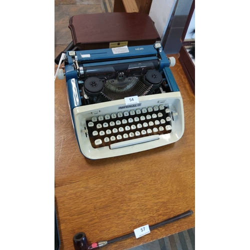 54 - Vintage Imperial Safari manual typewriter from the mid-20th century. Blue and white casing with clas... 