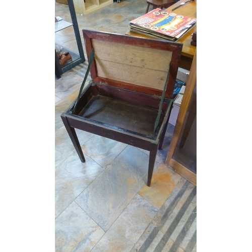 65 - Vintage wooden piano bench with lift-up storage compartment and upholstered cushioned seat in mustar... 