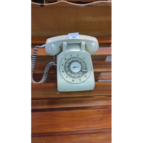 69 - Vintage Northern Telecom rotary dial telephone, from the 1970s-1980s. Cream-colored plastic body wit... 