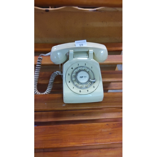 69 - Vintage Northern Telecom rotary dial telephone, from the 1970s-1980s. Cream-colored plastic body wit... 