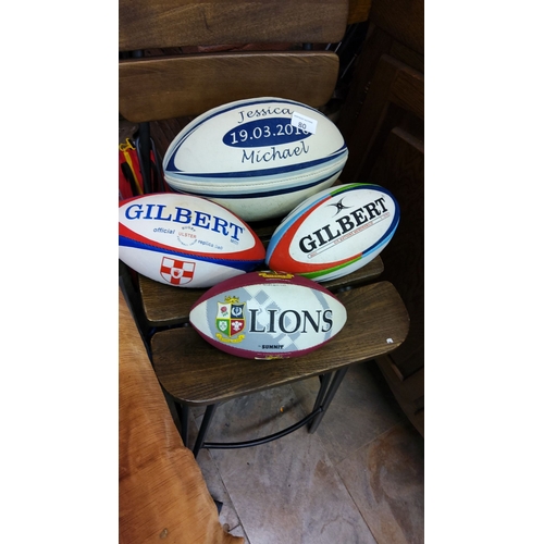 80 - Four rugby balls, including Gilbert Ulster and Six Nations editions, plus a Summit British & Irish L... 