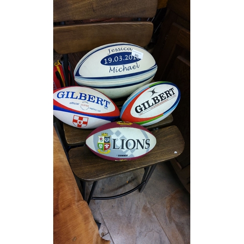 80 - Four rugby balls, including Gilbert Ulster and Six Nations editions, plus a Summit British & Irish L... 