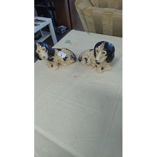 9 - Pair of vintage ceramic dachshund figurines, hand-painted in black and cream tones.