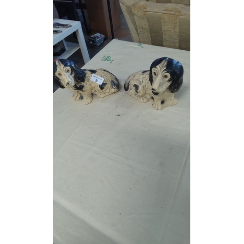 9 - Pair of vintage ceramic dachshund figurines, hand-painted in black and cream tones.