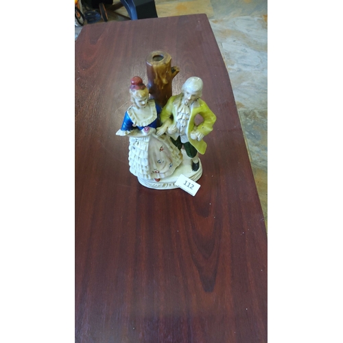 112 - Staffordshire-style earthenware spill vase modelled as an 18th-century courting couple beside a tree... 