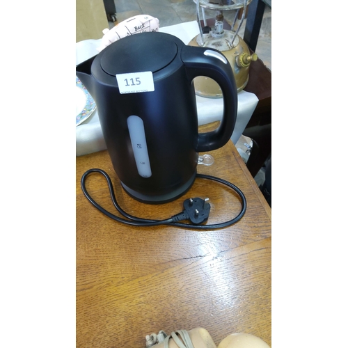 115 - Black plastic electric jug kettle with detachable base, 1.5 L water level indicator and UK three-pin... 