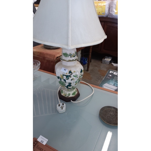 61 - Porcelain baluster-form Masons chartreuse table lamp, white grabric shade, circa mid-20th century.