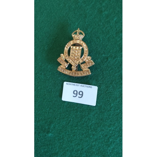 99 - Gilt brass cap badge of the British Royal Army Ordnance Corps, crowned Garter bearing motto with cen... 