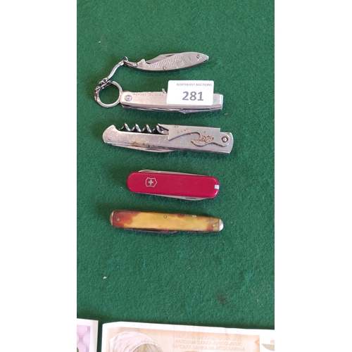 Group of five folding pocket knives: Victorinox red Swiss Army ...