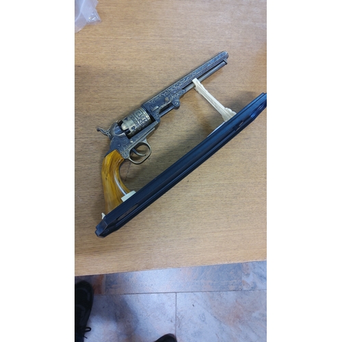 36 - Decorative die-cast model of a Colt-style percussion revolver, late 20th century, with engraved barr... 