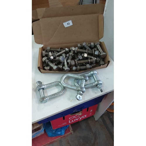 41 - Box of steel hex bolts with matching nuts, accompanied by three galvanised D-shackles.