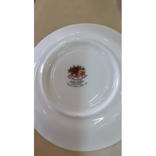 46 - Set of six Royal Albert “Old Country Roses” bone china saucers, gilt-edged with crimson and yellow r... 