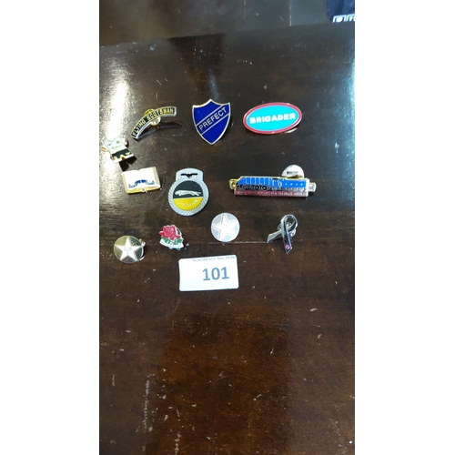 101 - Group of eleven British novelty enamel and metal lapel pins, including Flying Scotsman locomotive, J... 