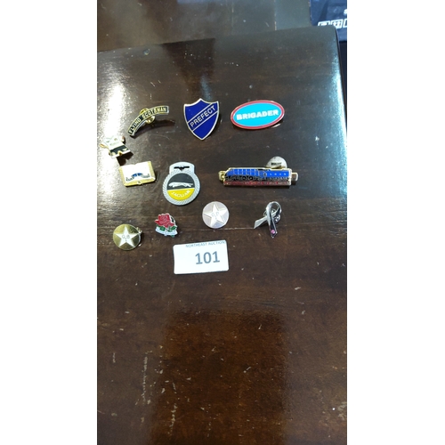 101 - Group of eleven British novelty enamel and metal lapel pins, including Flying Scotsman locomotive, J... 