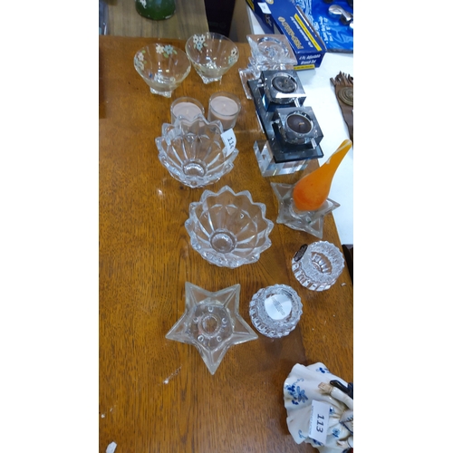 114 - Assorted lot of c.12 pressed and moulded clear glass pieces: scalloped bowls, star-shaped and ribbed... 