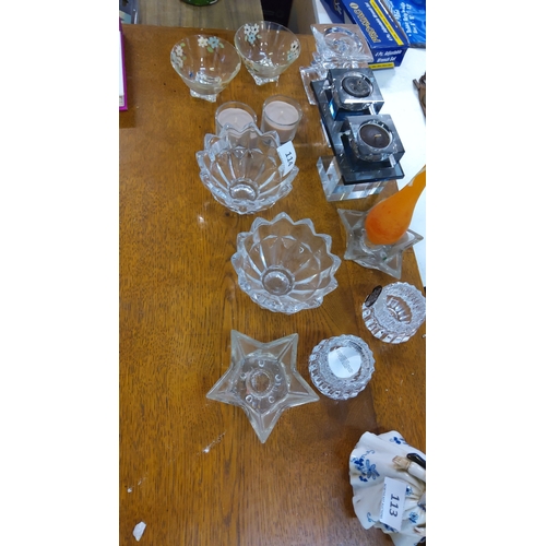 114 - Assorted lot of c.12 pressed and moulded clear glass pieces: scalloped bowls, star-shaped and ribbed... 