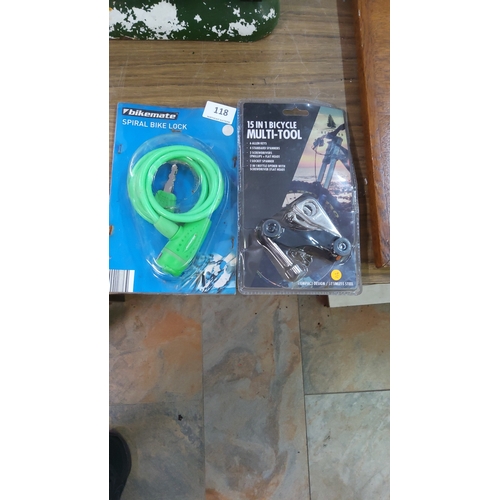 118 - Two packaged bicycle accessories: a Bikemate spiral cable lock with keys and a compact 15-in-1 stain... 