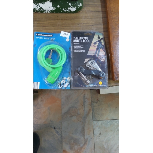 118 - Two packaged bicycle accessories: a Bikemate spiral cable lock with keys and a compact 15-in-1 stain... 