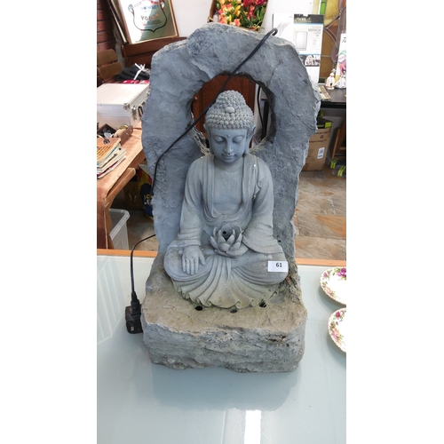 61 - Cast stone-effect resin garden water fountain, modelled as a seated Buddha in meditation beneath a p... 