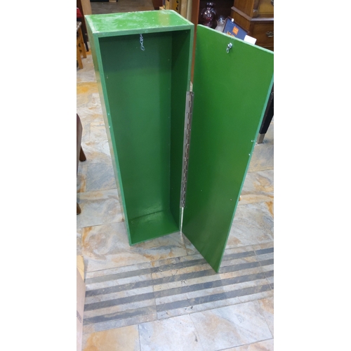 67 - Tall narrow pine cupboard with full-length piano-hinged door, green painted finish, wooden knob hand... 