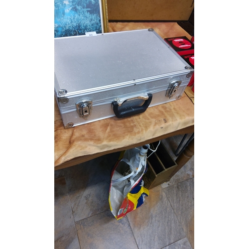 80 - Aluminium briefcase-style carry case with ribbed panels, twin clasp locks, metal corners and moulded... 